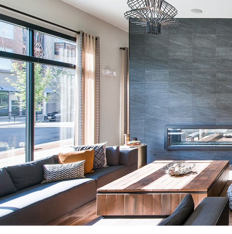 Seating area with coffee table and fireplace.