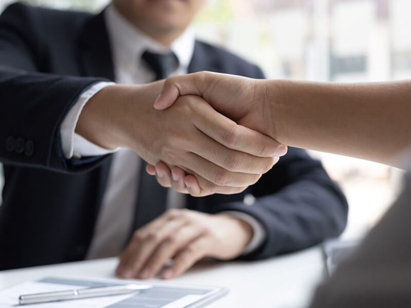 business professionals shaking hands