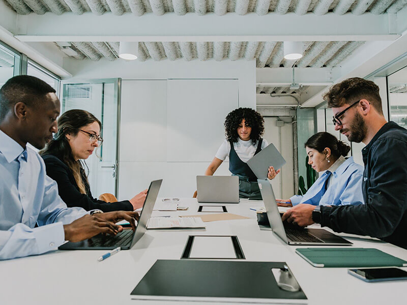 team collaborating around a conference table